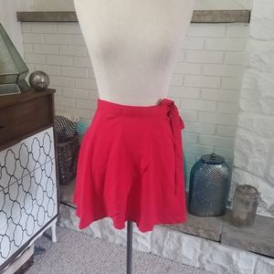 Red wrap circle skirt.